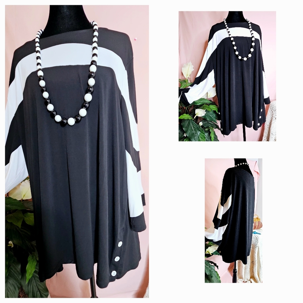 Black and white midi dress, cute buttons down below, size 1X. By MULTIPLE